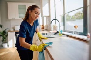 professional cleaners maintaining a coastal vacation home interior
